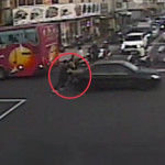 女警推故障車。林重鎣