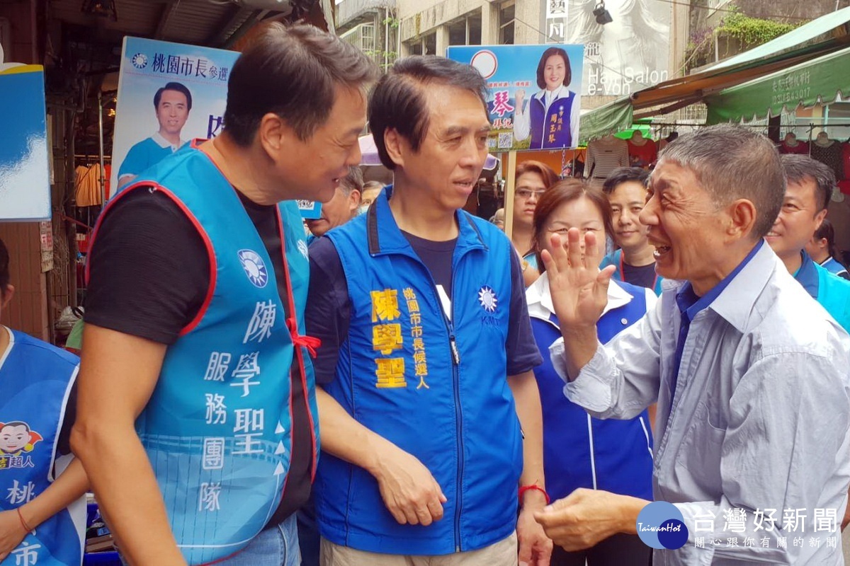 國民黨中央助選團副團長周錫瑋陪同桃園市長候選人陳學聖到埔心市場拜票，民眾反應熱烈。